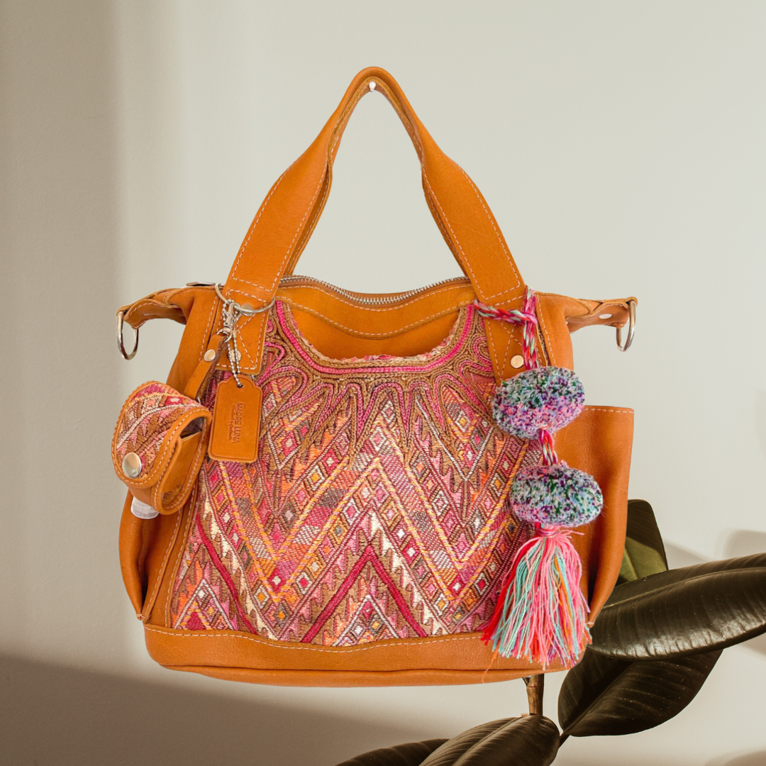 Brown leather shoulder bag with a detachable golden chain